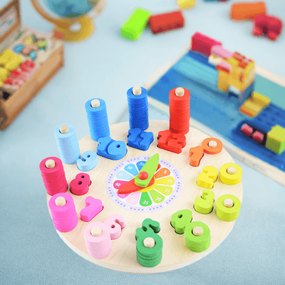 colorful wooden educational toy featuring a circular base with pegs and various shapes with holes for sorting and stacking. The toy includes number blocks, geometric shapes, and spools in vibrant primary and pastel colors, designed to enhance cognitive skills, hand-eye coordination, and fine motor skills in children